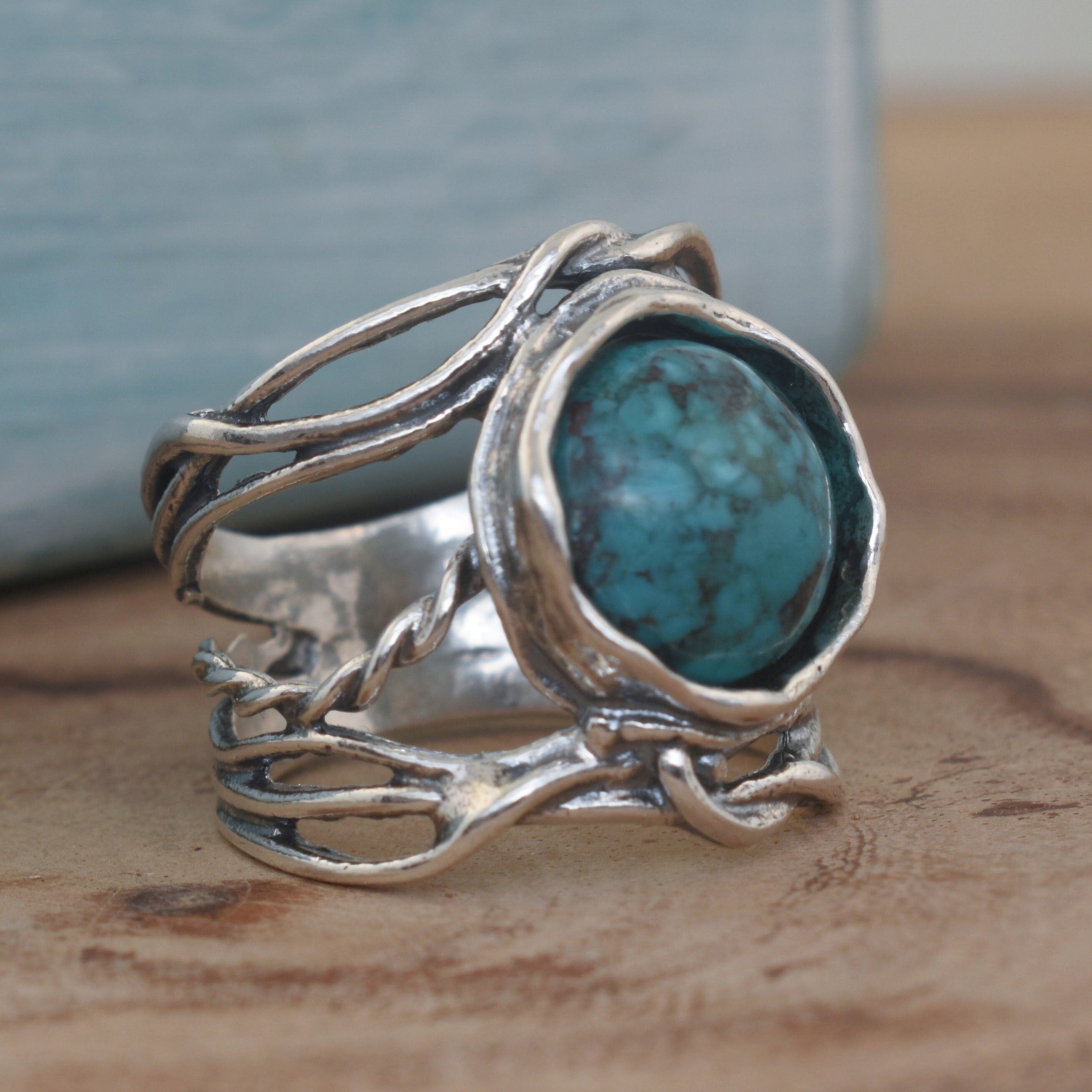 reconstructed turquoise ring bezel set in sterling silver