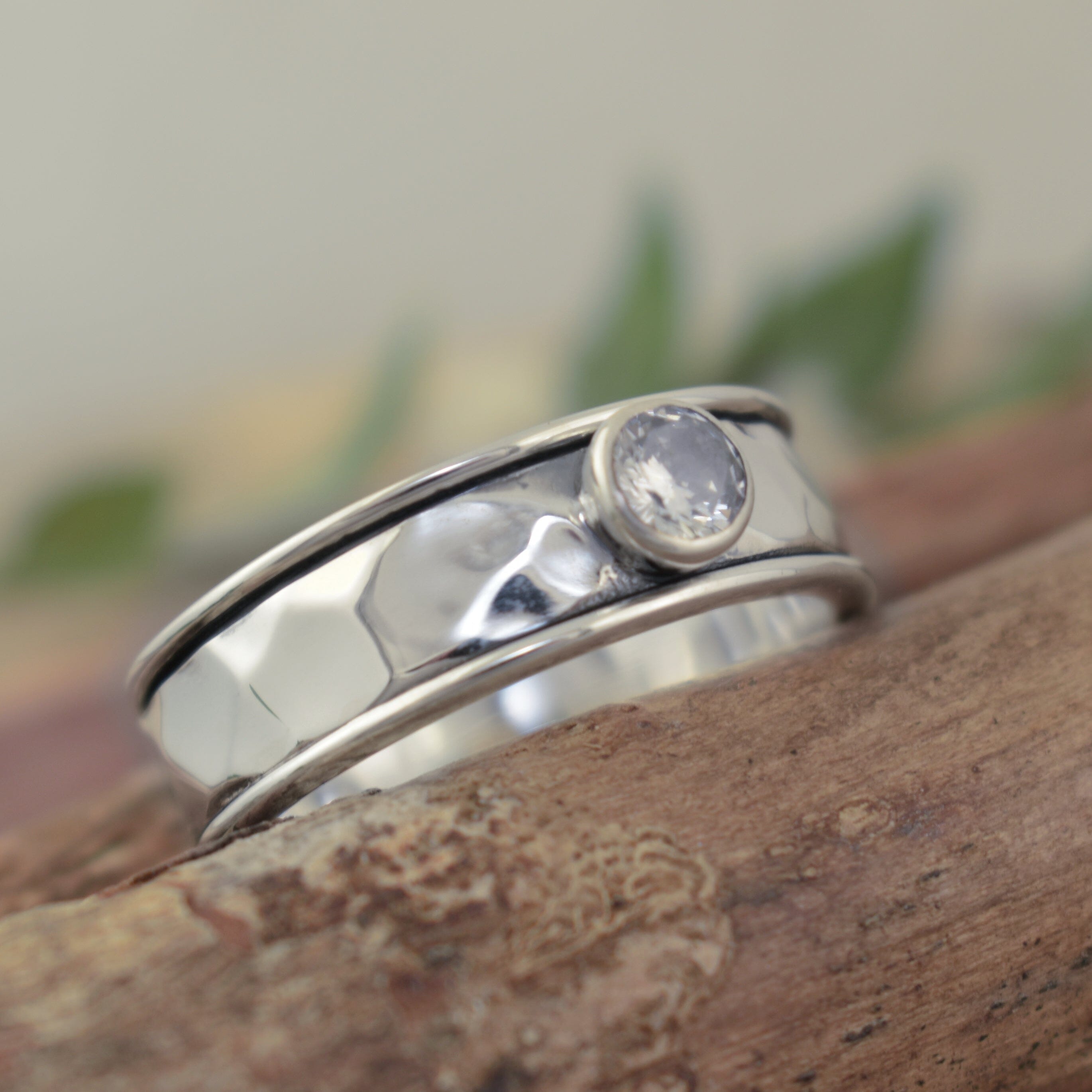 Handcrafted sterling silver and cz spinner ring
