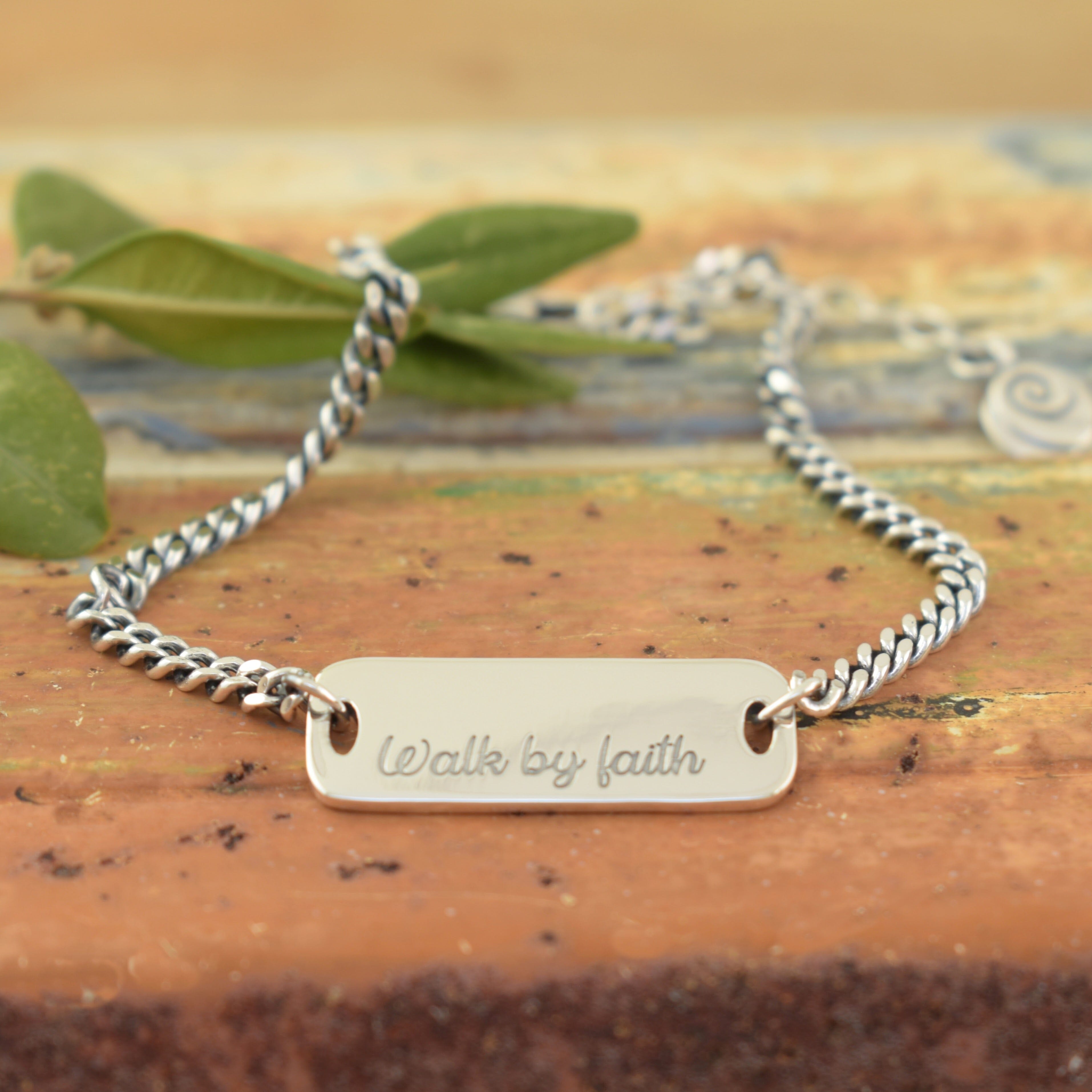 Sterling silver chain bracelet with a stamped plate 
