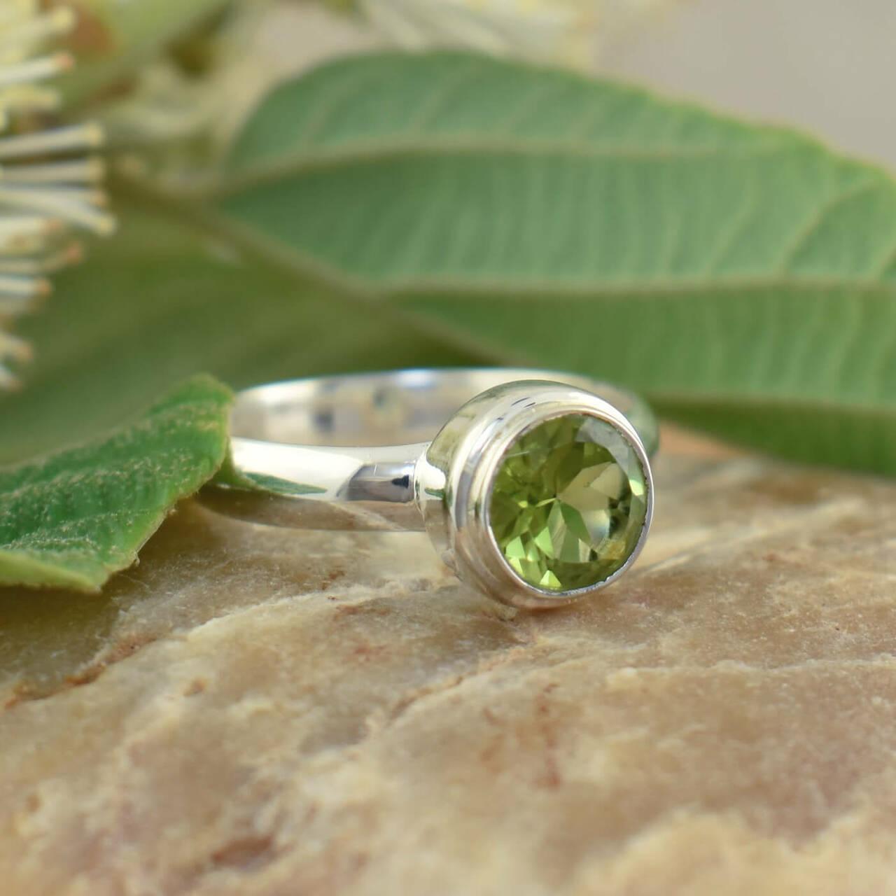 Green stone ring with sterling silver band