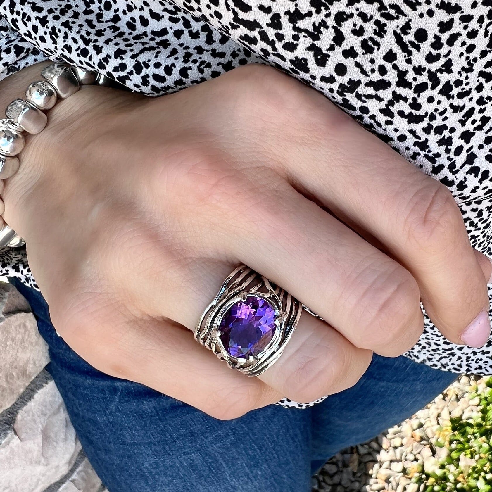 chunky sterling silver ring featuring an oval amethyst stone