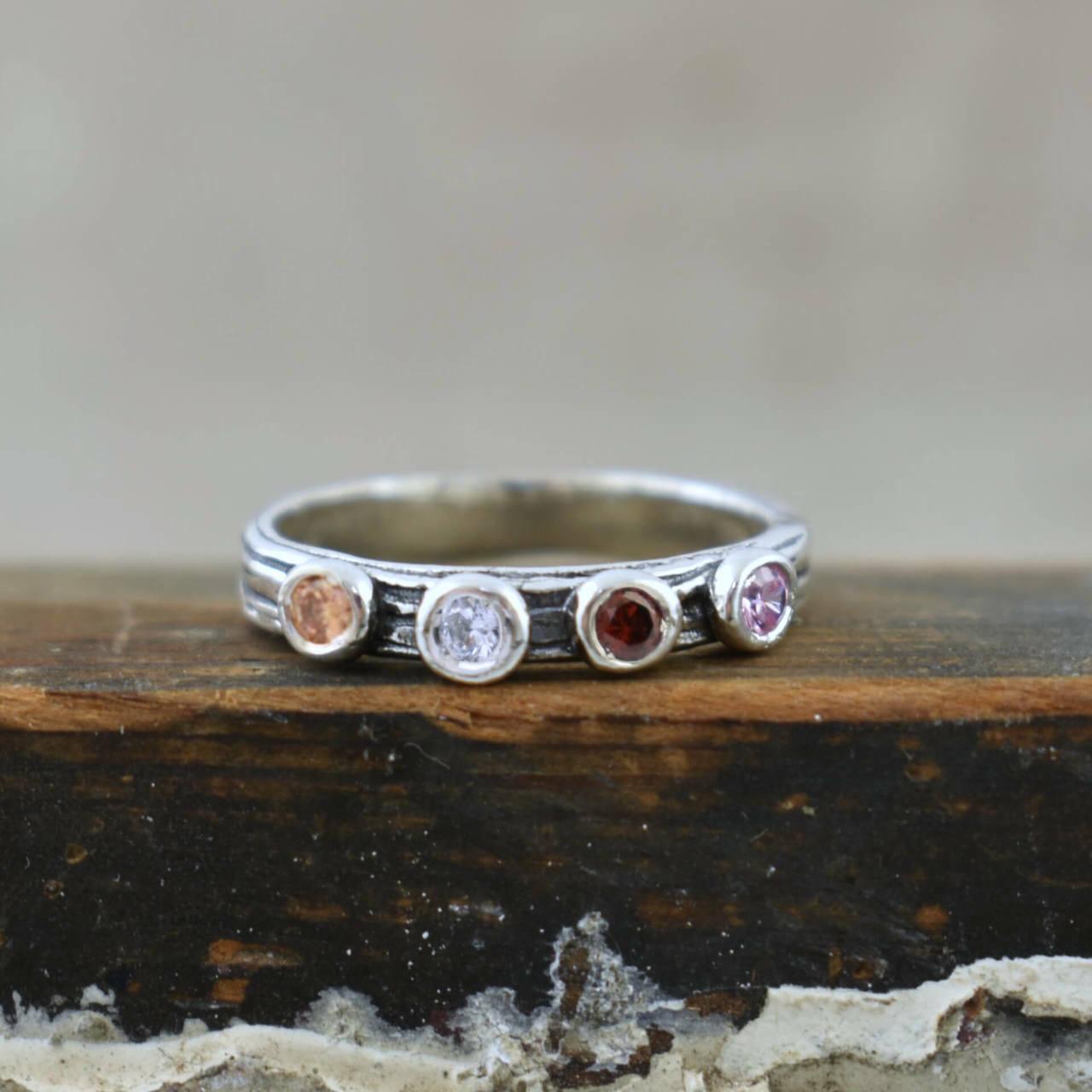 Handcrafted sterling silver and CZ birthstone ring