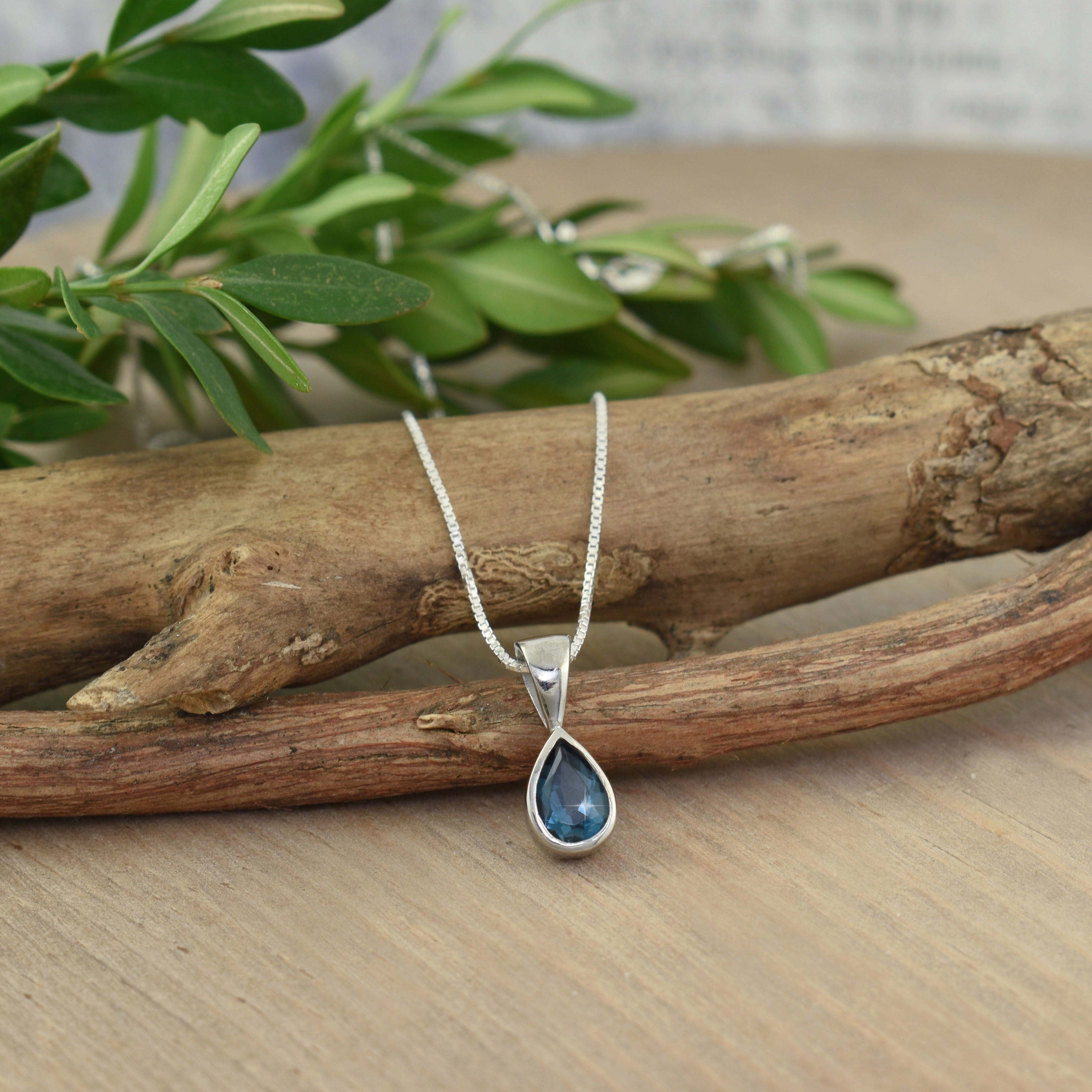 .925 sterling silver necklace featuring a London blue topaz teardrop stone