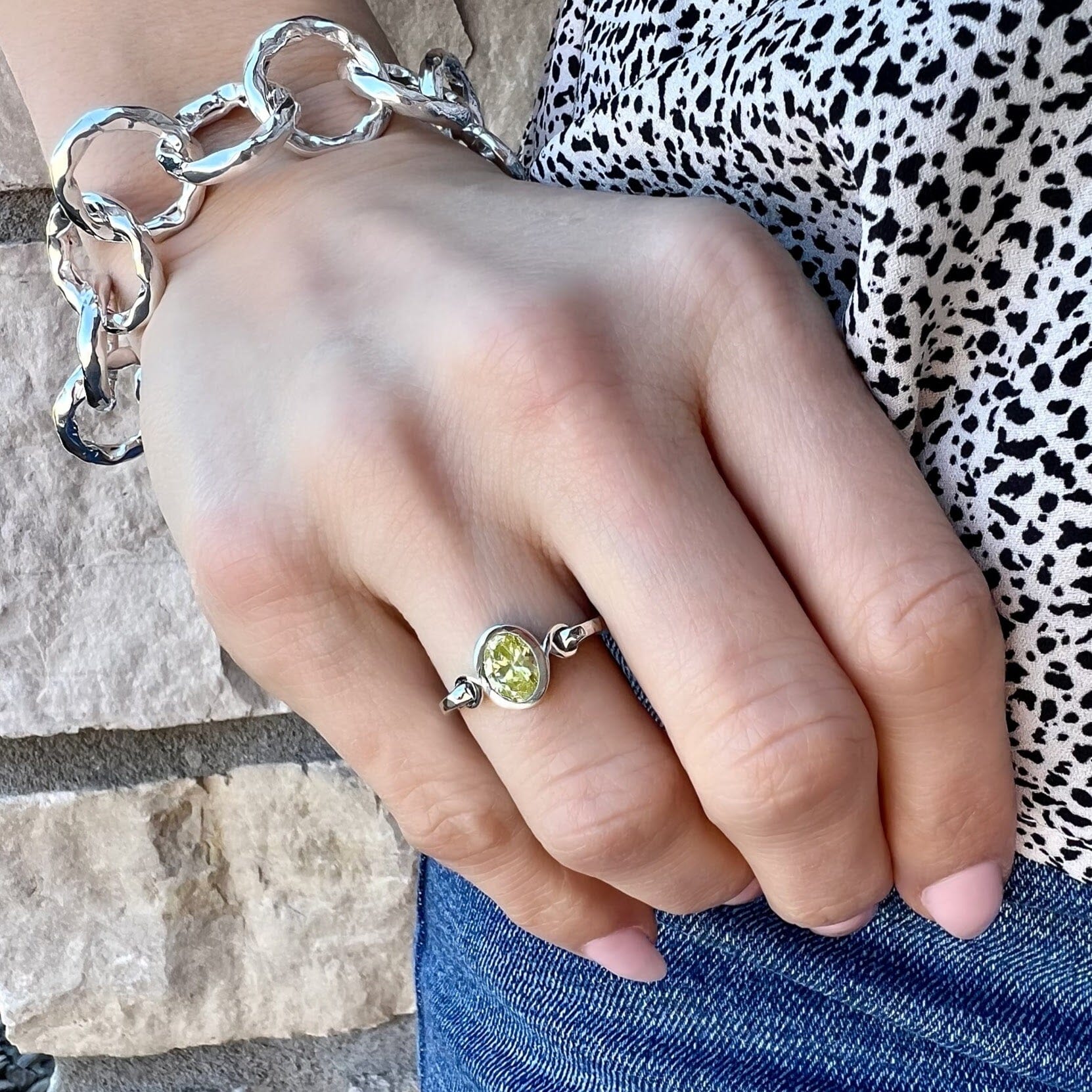 sterling silver link bracelet paired with a peridot ring - Pear-Adise