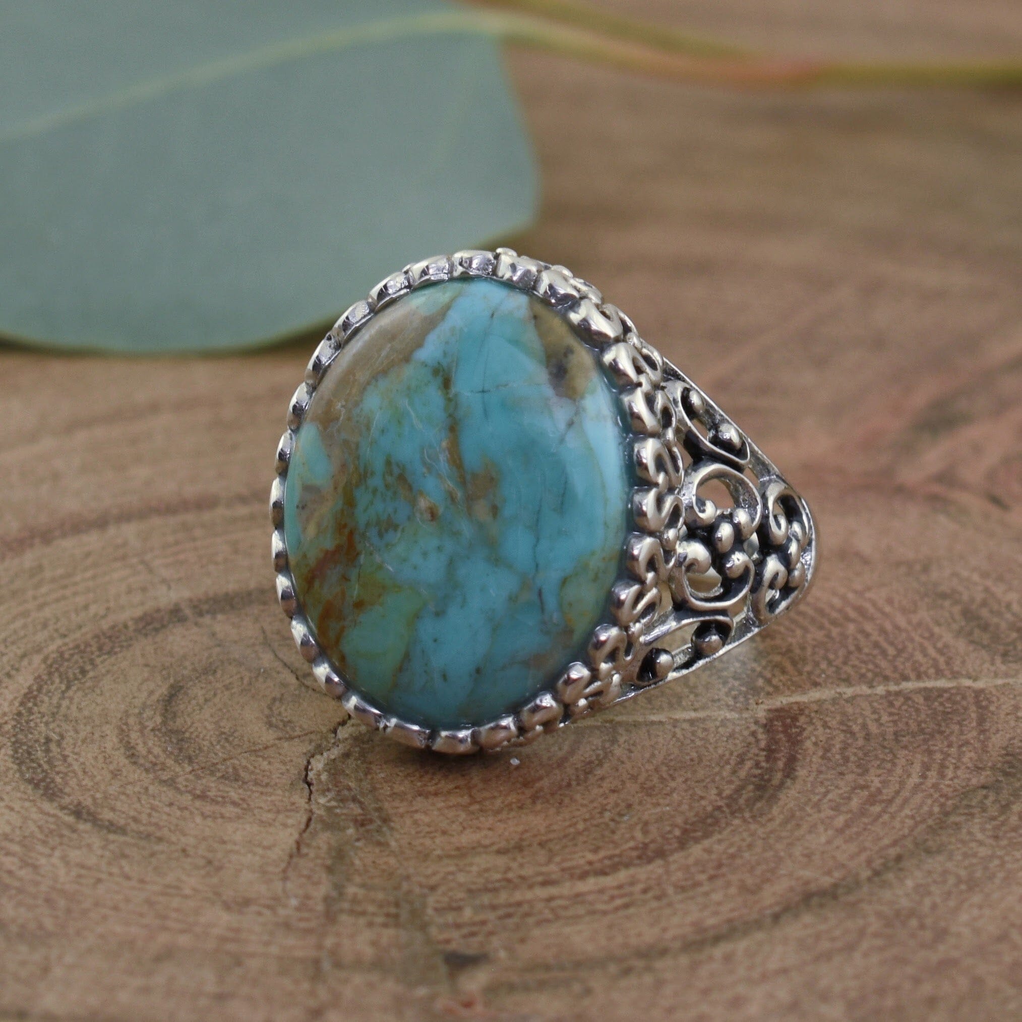 .925 sterling silver filigree ring with oval turquoise stone