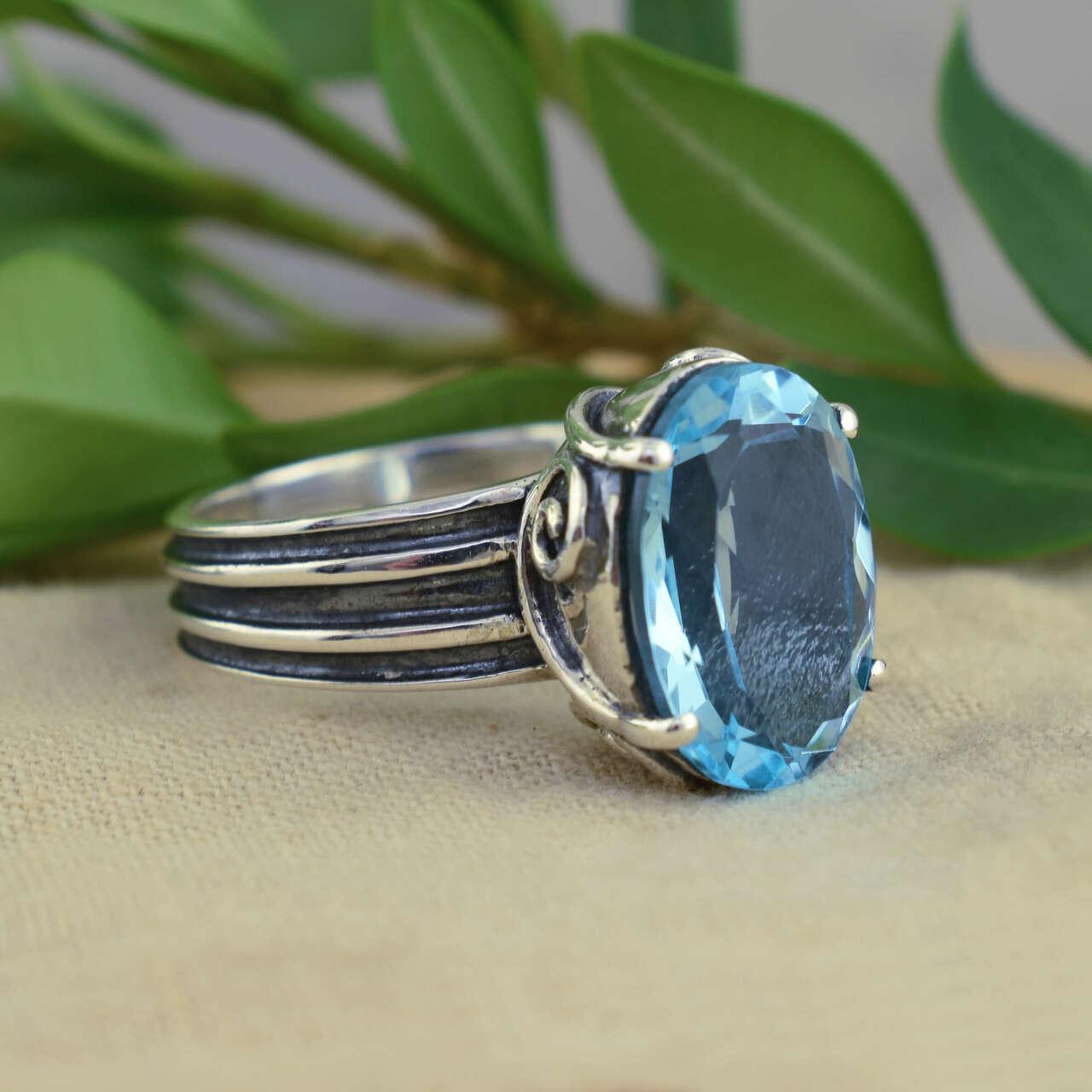 .925 sterling silver ring with center blue CZ
