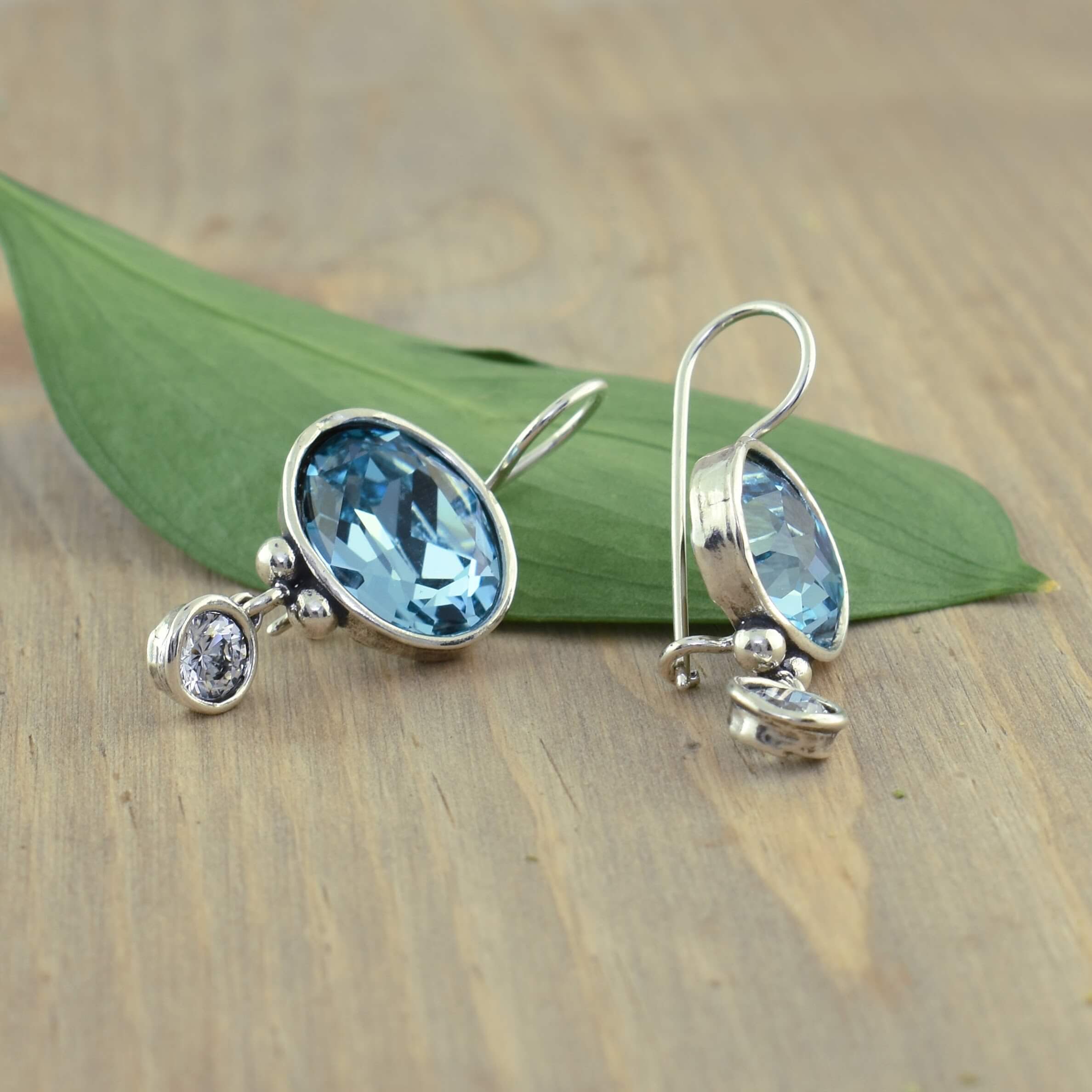 sterling silver earrings with sky blue and clear cz