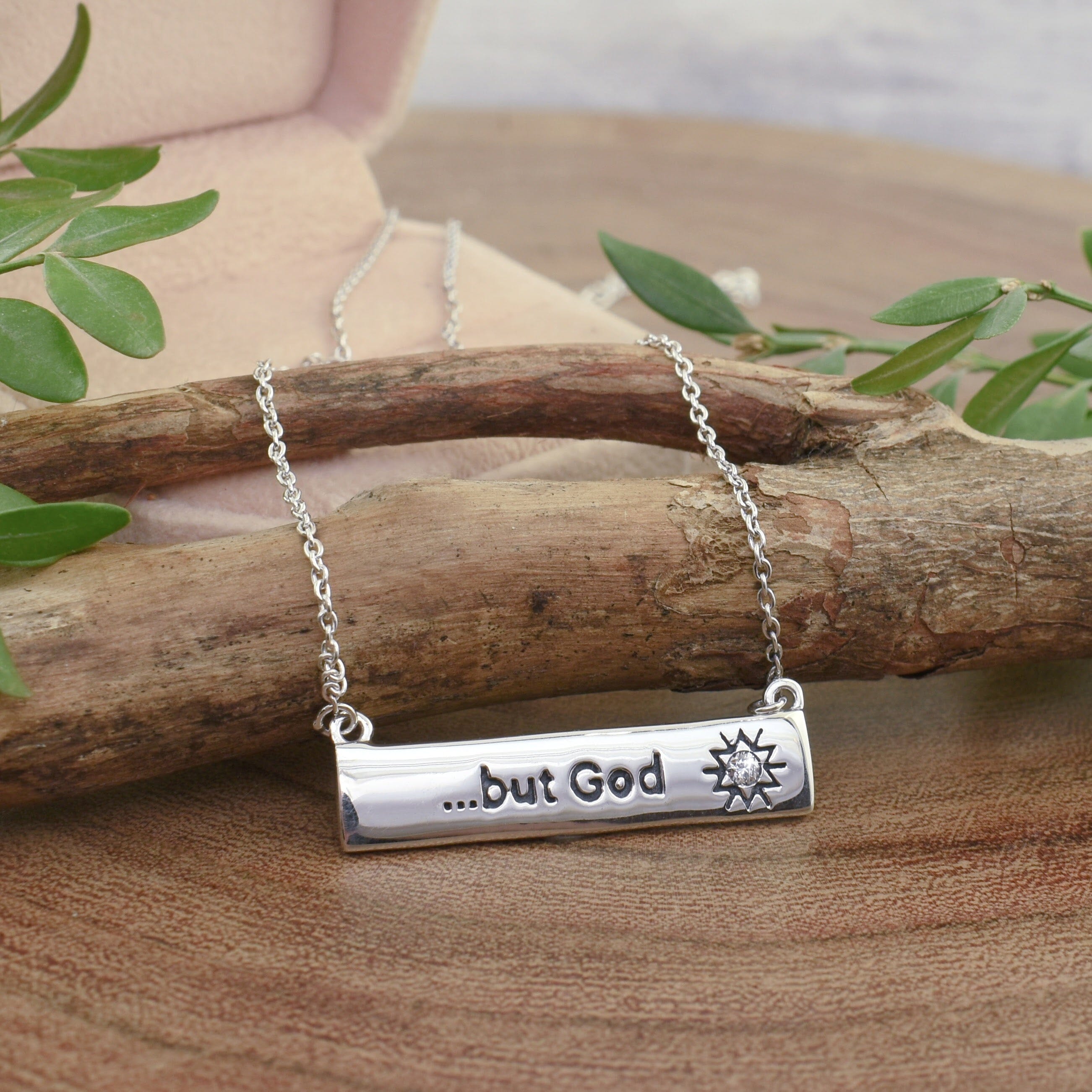 dainty .925 sterling silver bar necklace featuring a tiny diamond