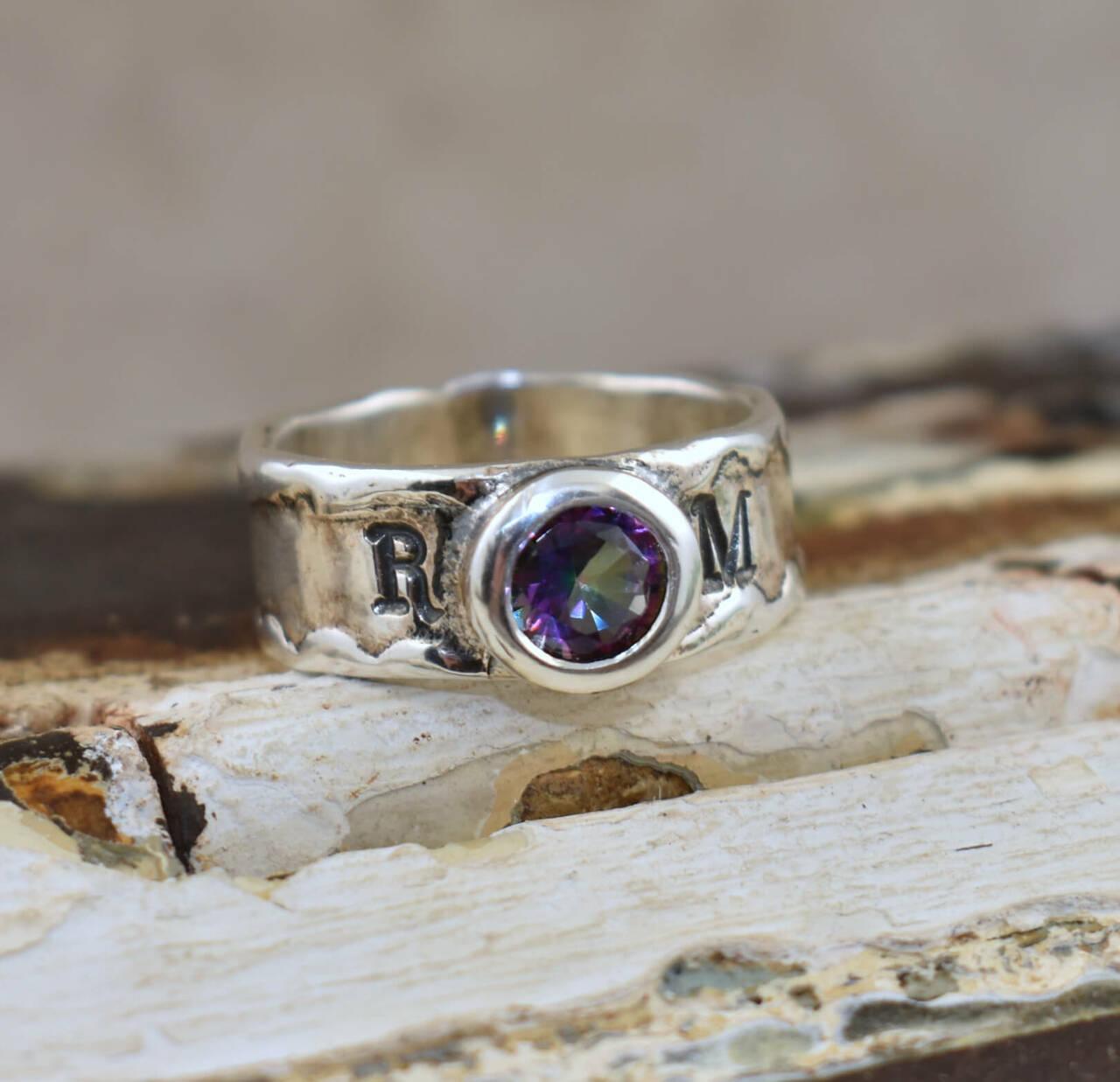 Handcrafted sterling silver and mystic topaz