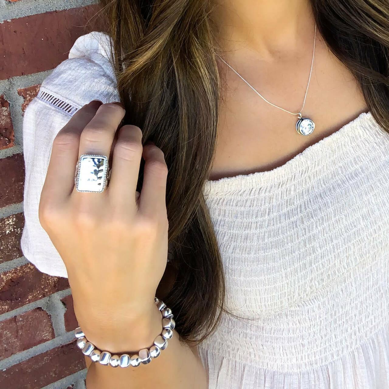 Cassidy Ring featured with Bellissimo Necklace and Roundabout Bracelet