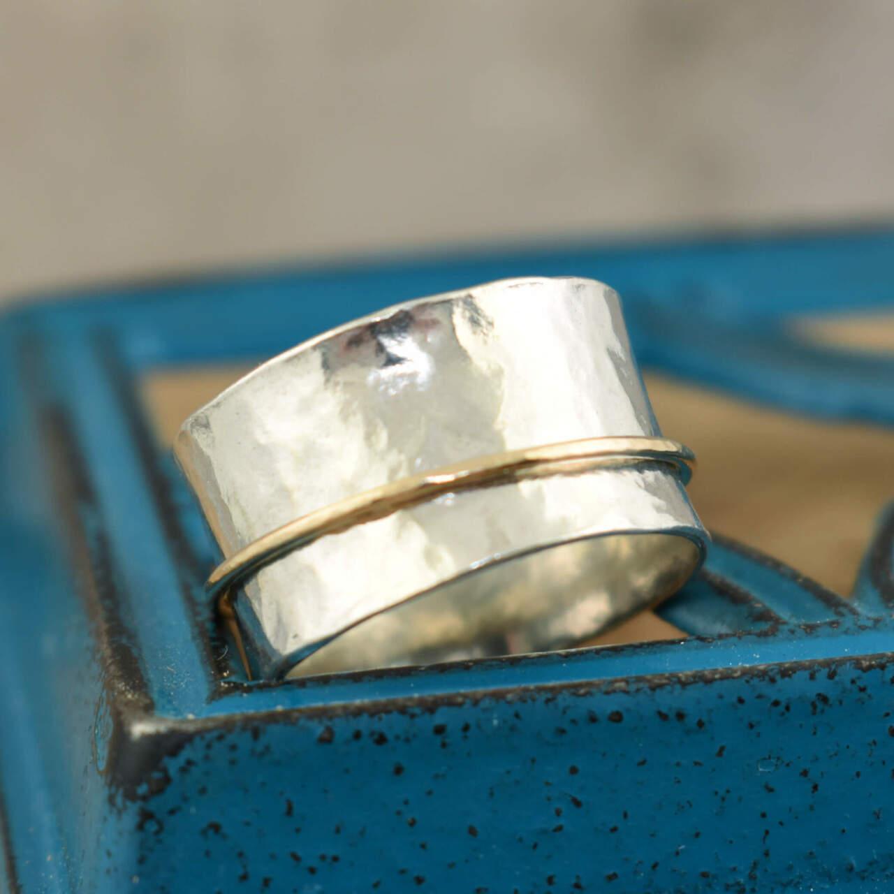 Sterling silver ring with single gold filled spinner band