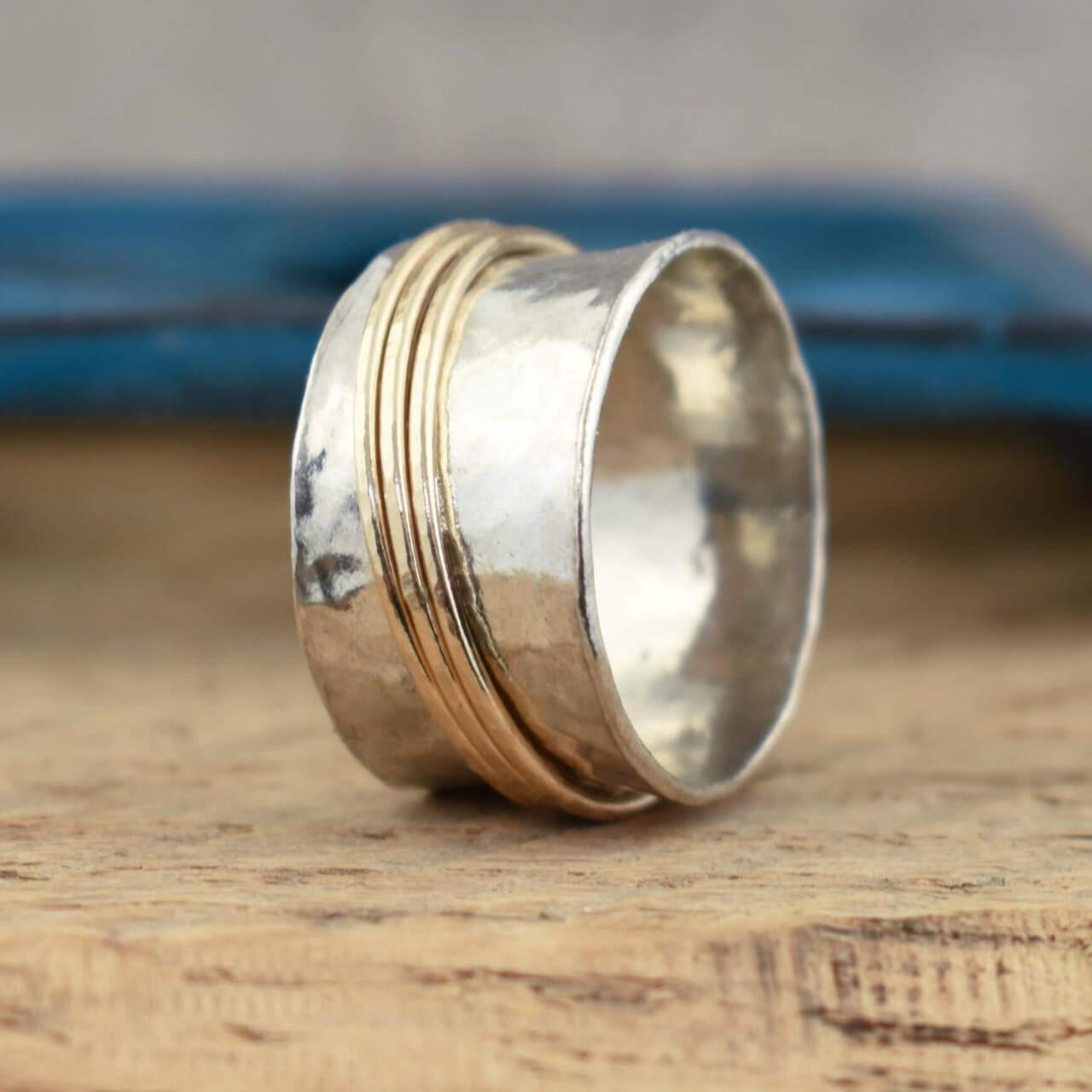 Sterling silver ring with three gold filled spinner bands