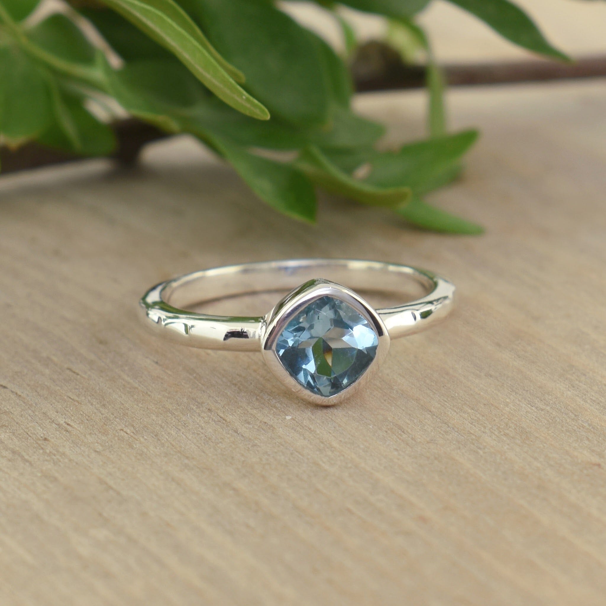 .925 sterling silver ring featuring blue crystal
