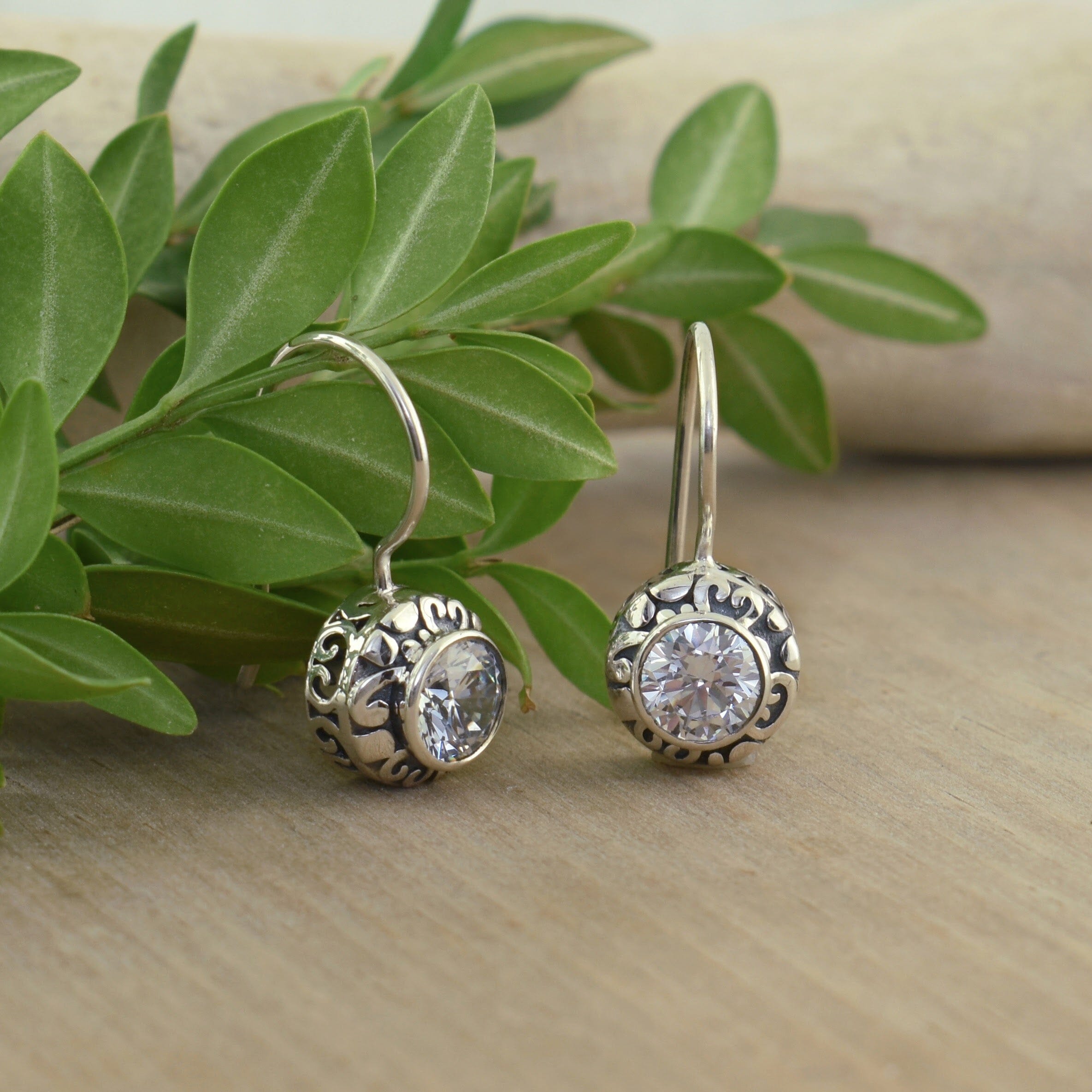 dainty .925 sterling silver wire hook earrings featuring cz