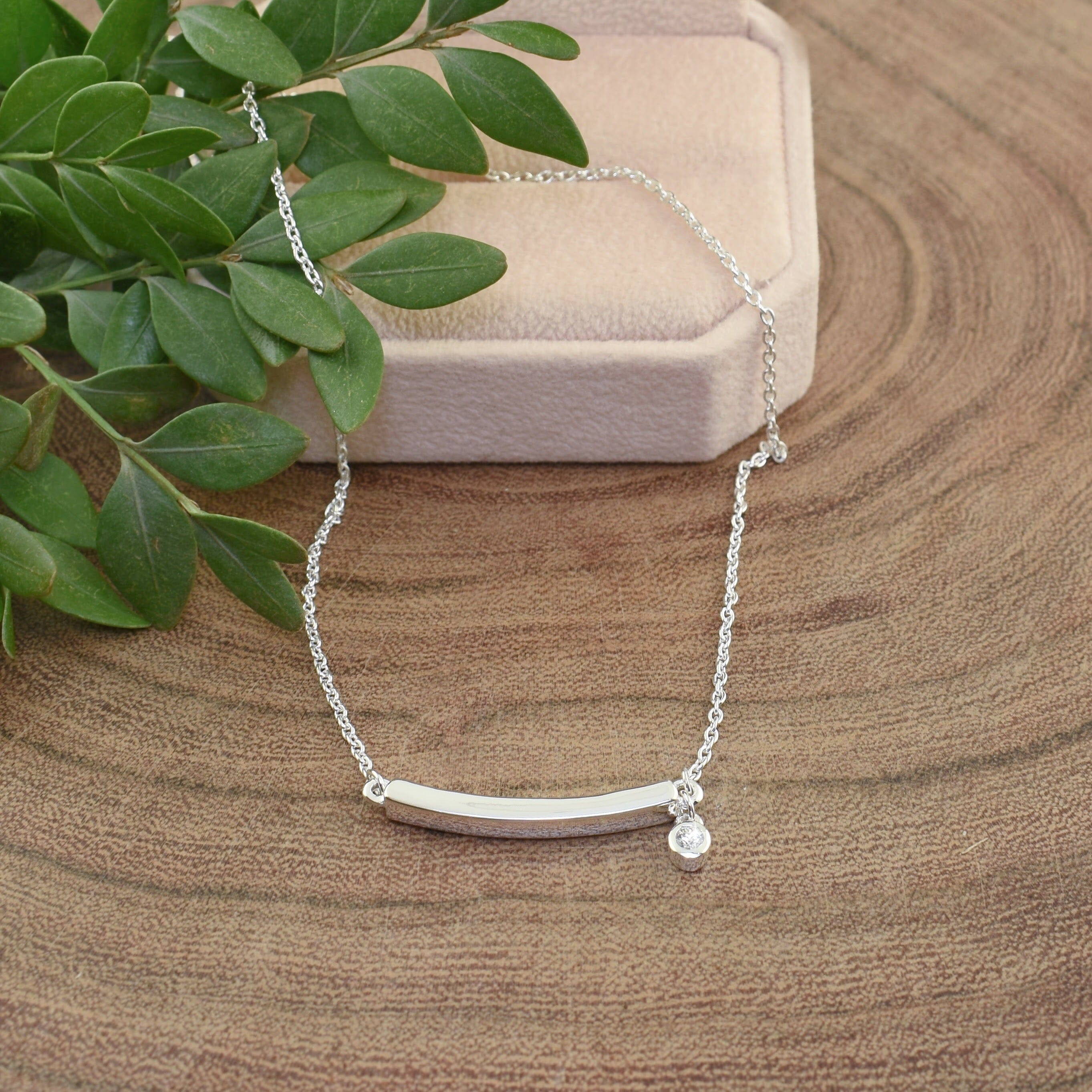 dainty necklace with a dangling diamond - Light At The End