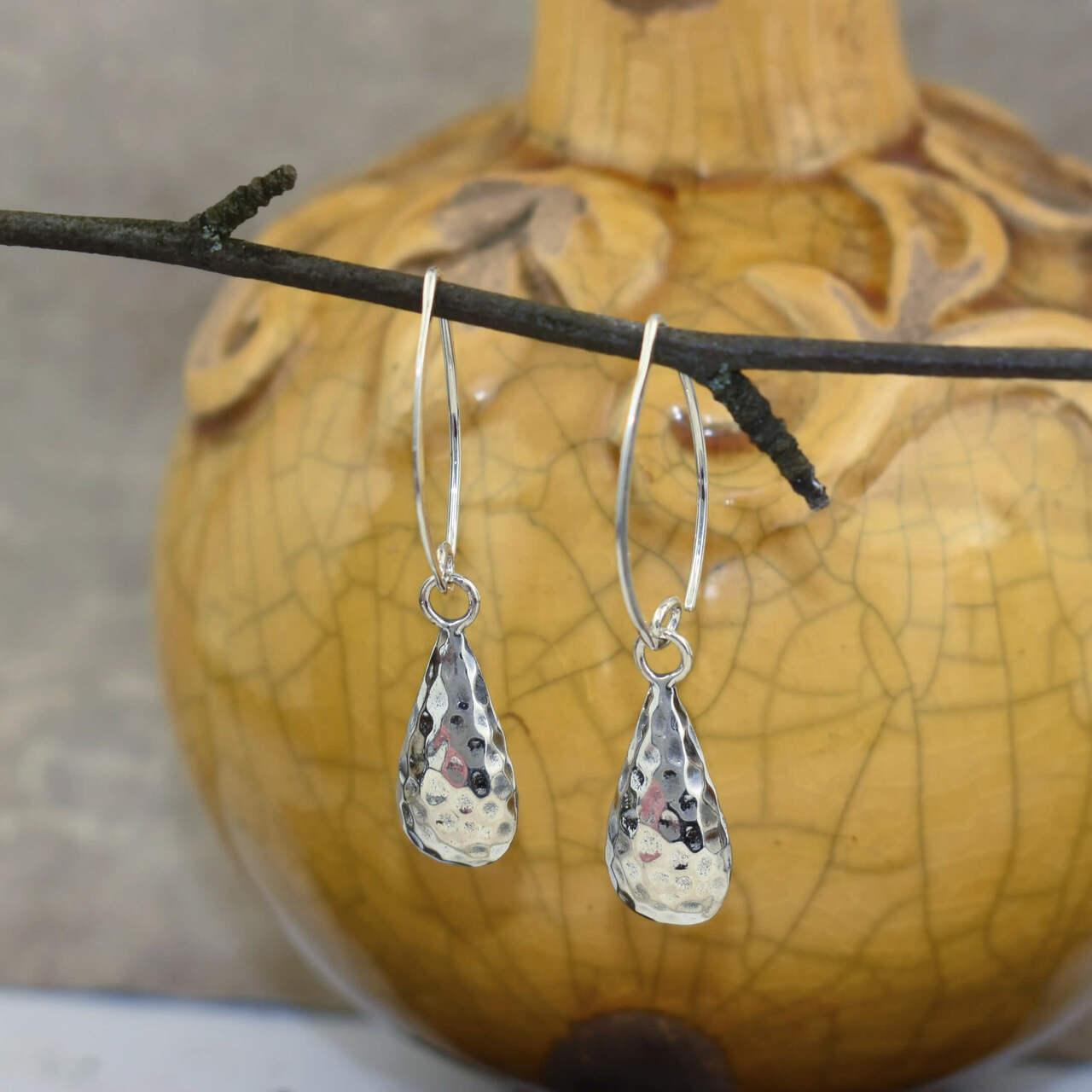 Sterling silver teardrop shaped earrings on v-hook wires