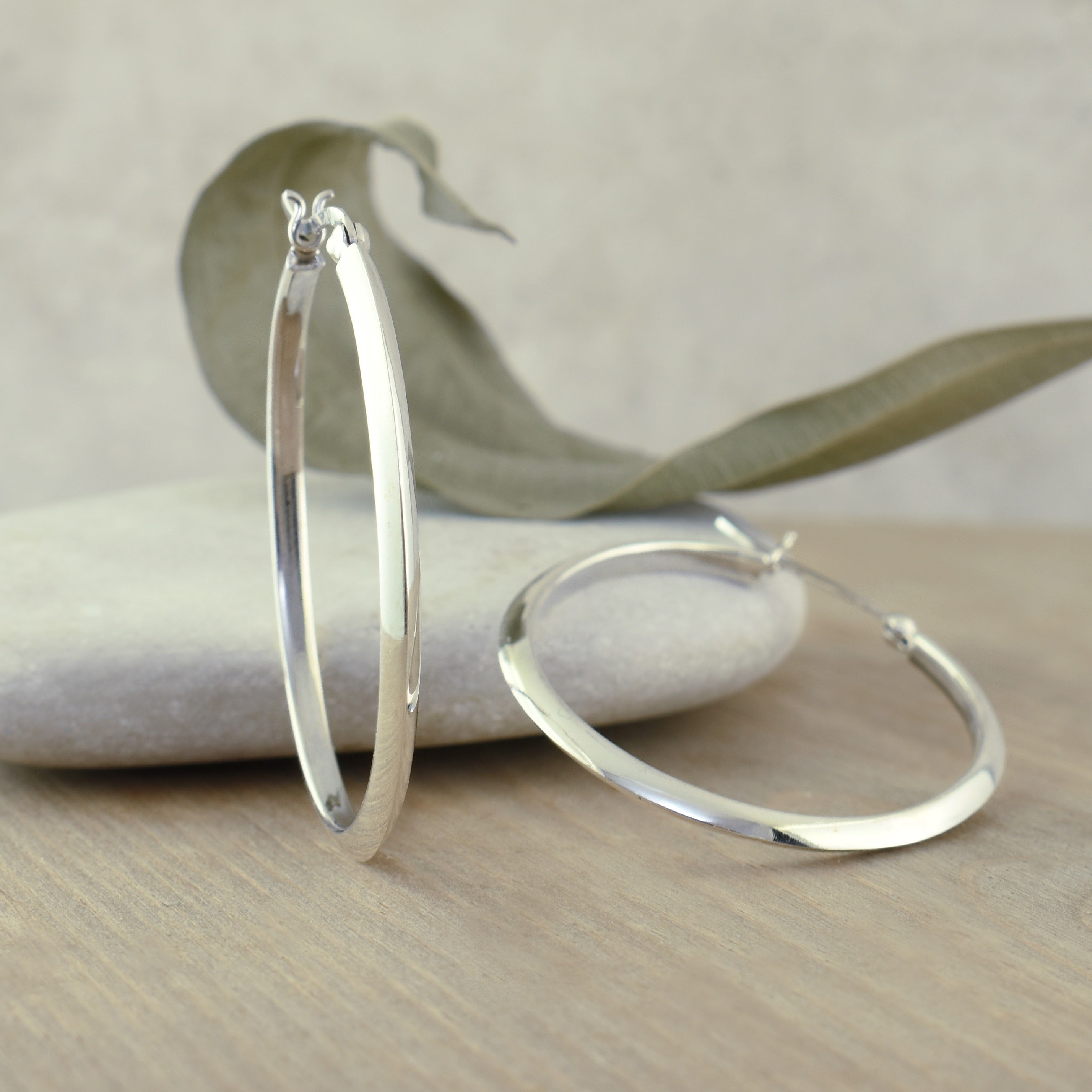 High polished sterling silver in v-snap closure style earrings