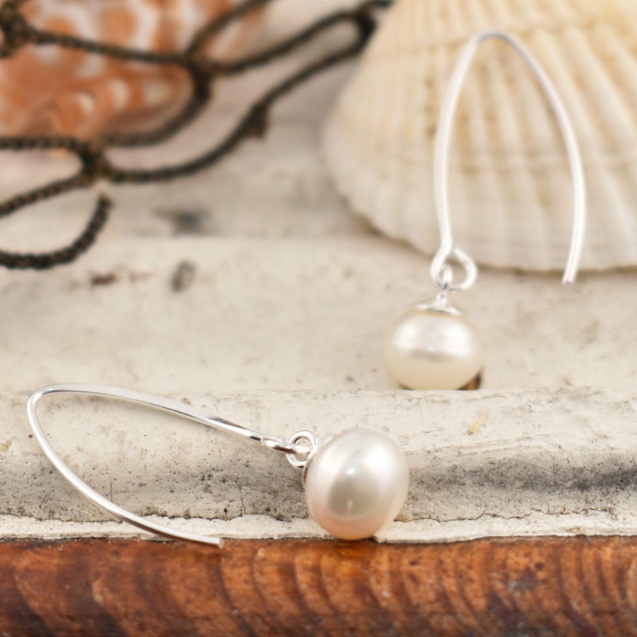 .925 sterling silver earrings featuring freshwater pearls
