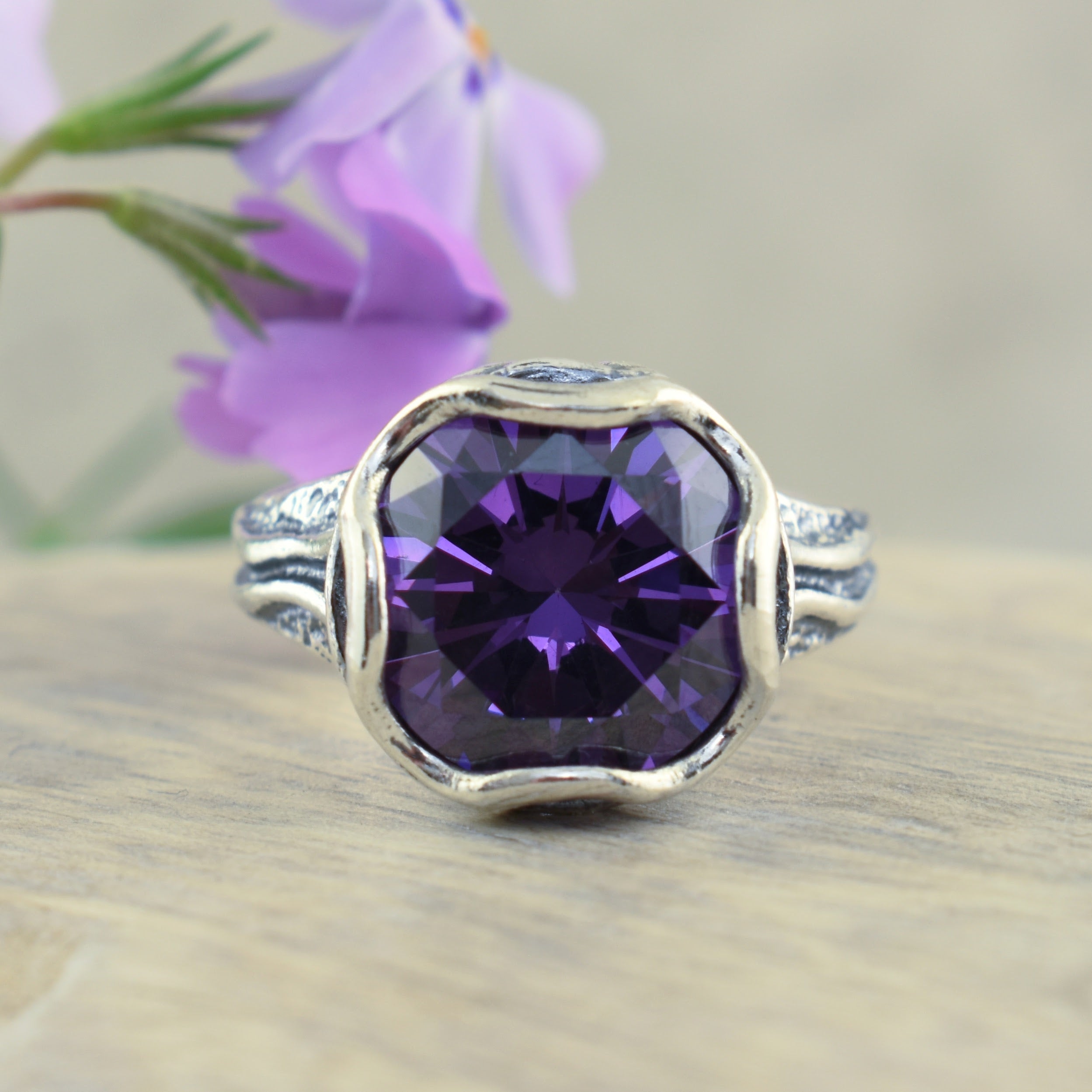 Amethyst cubic zirconia stone with sterling silver setting