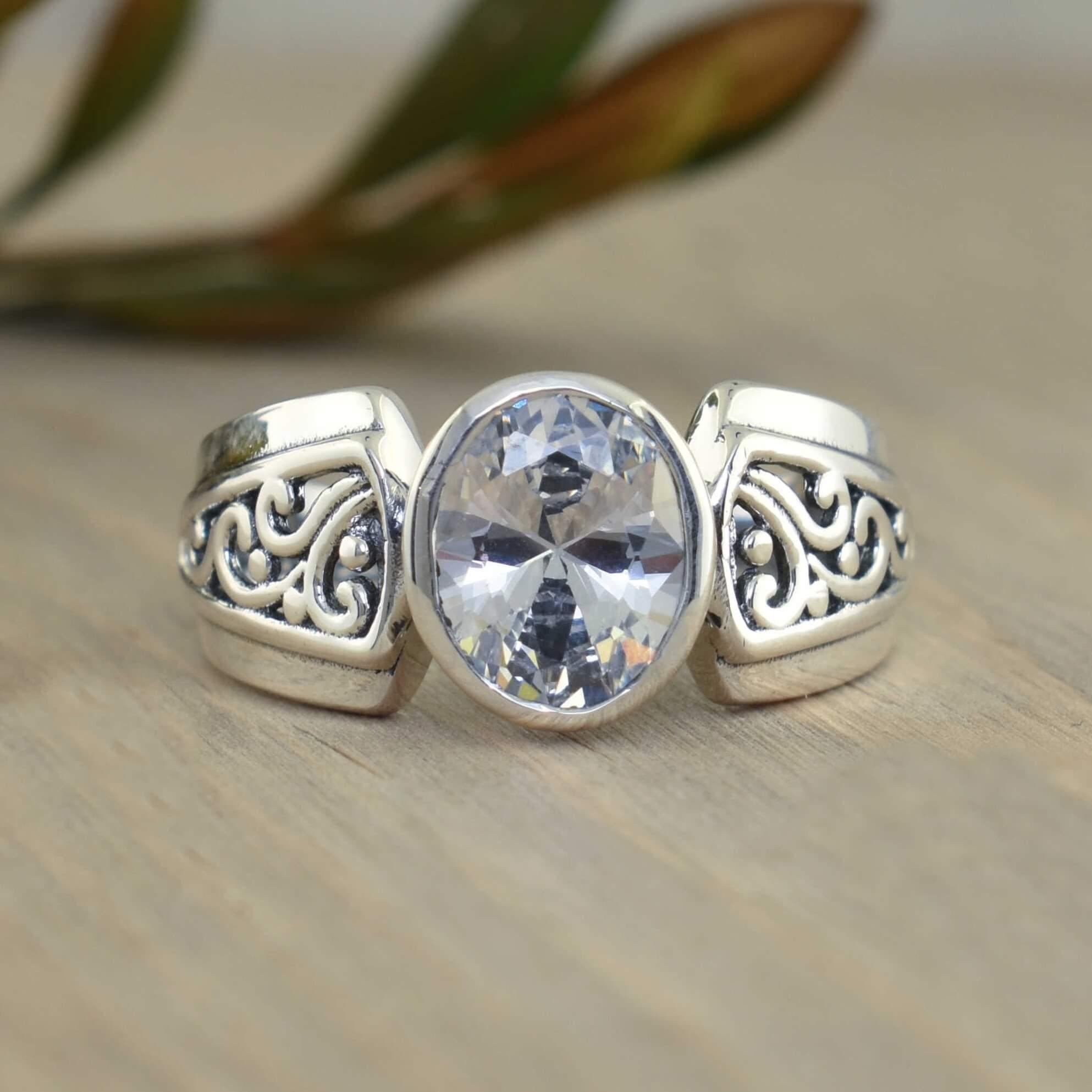 Filigree sterling silver ring with oval cz