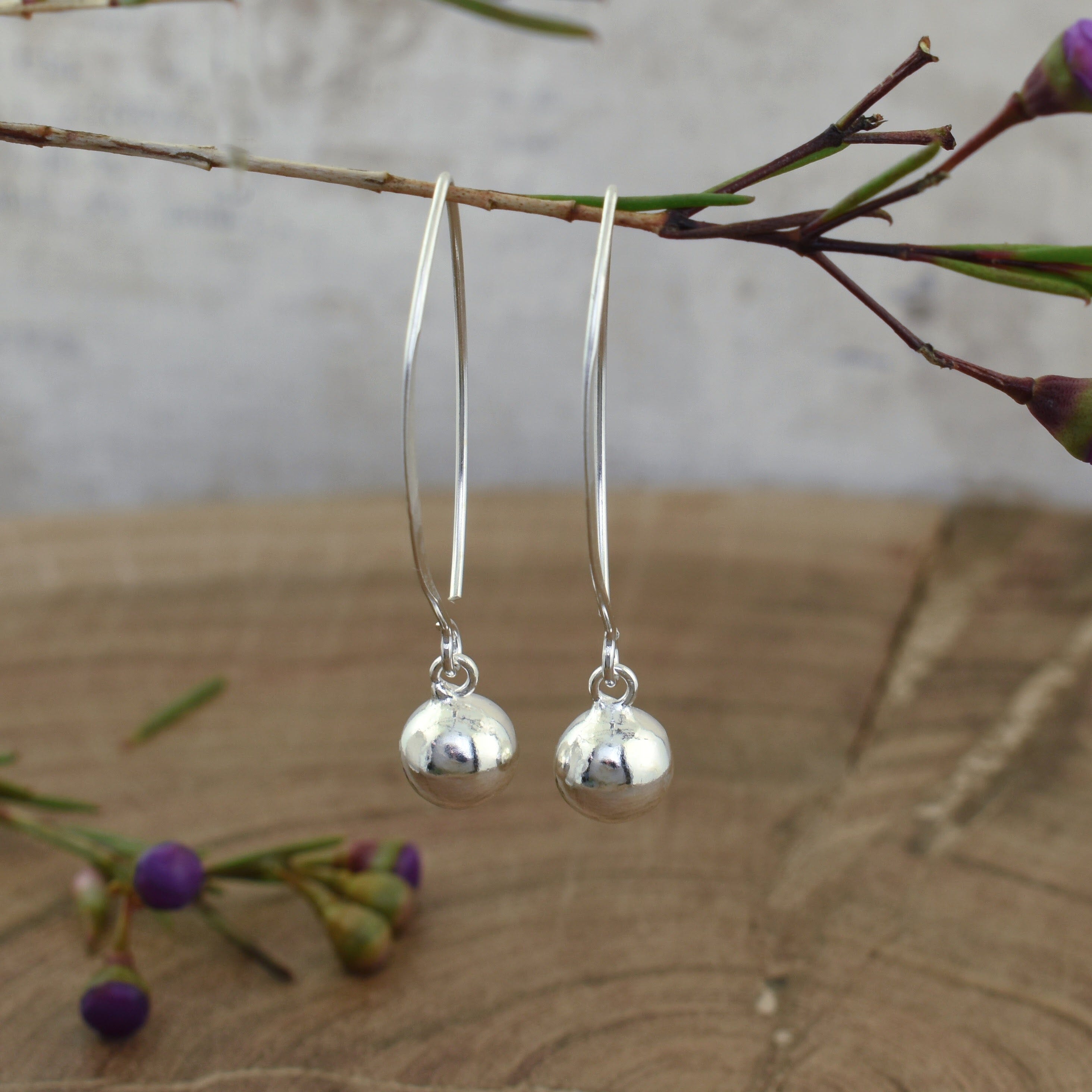 .925 sterling silver earrings with dangling sterling silver ball