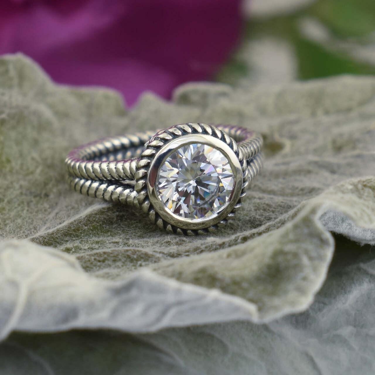 Cubic zirconia clear stone in .925 sterling silver ring setting