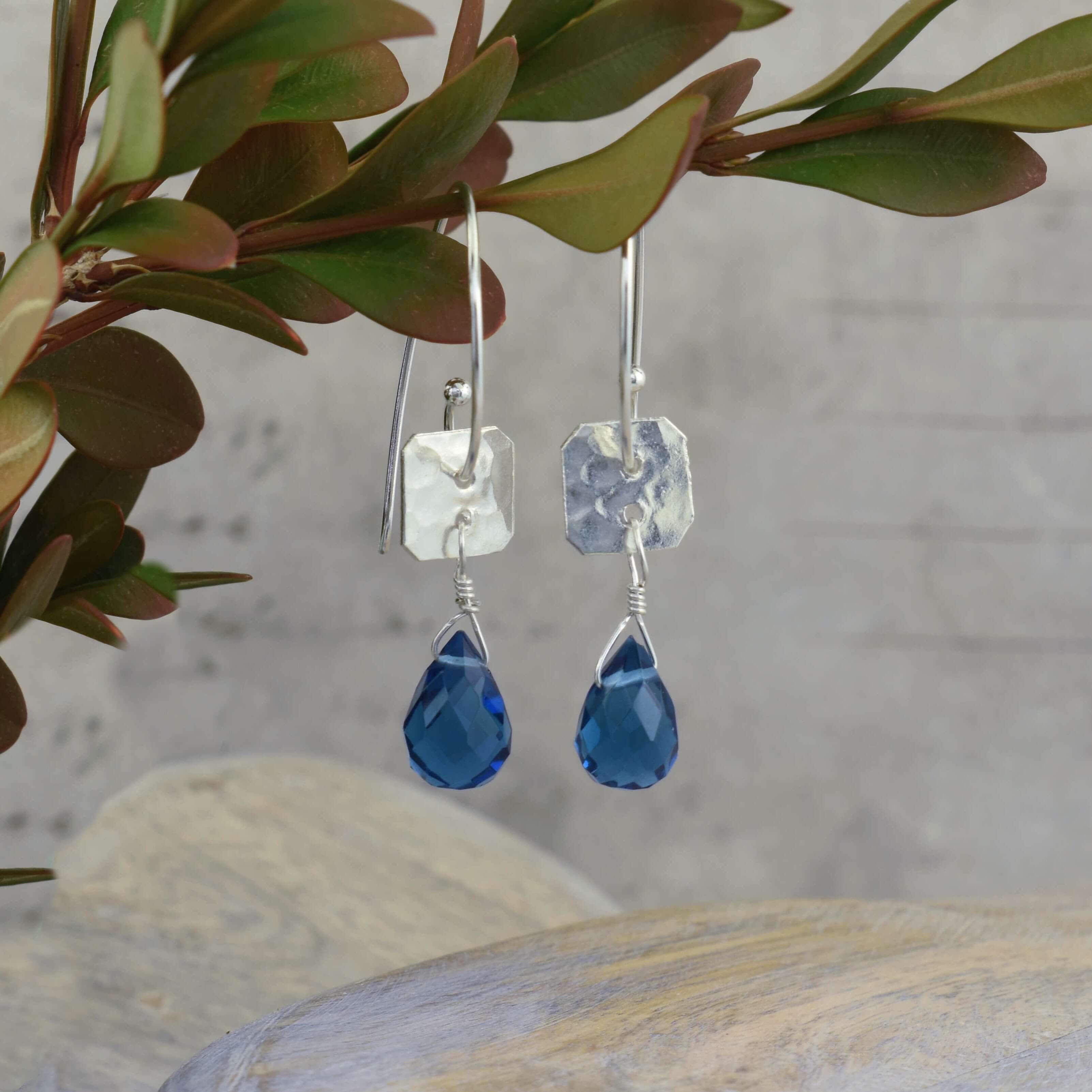 .925 sterling silver earrings with blue crystal