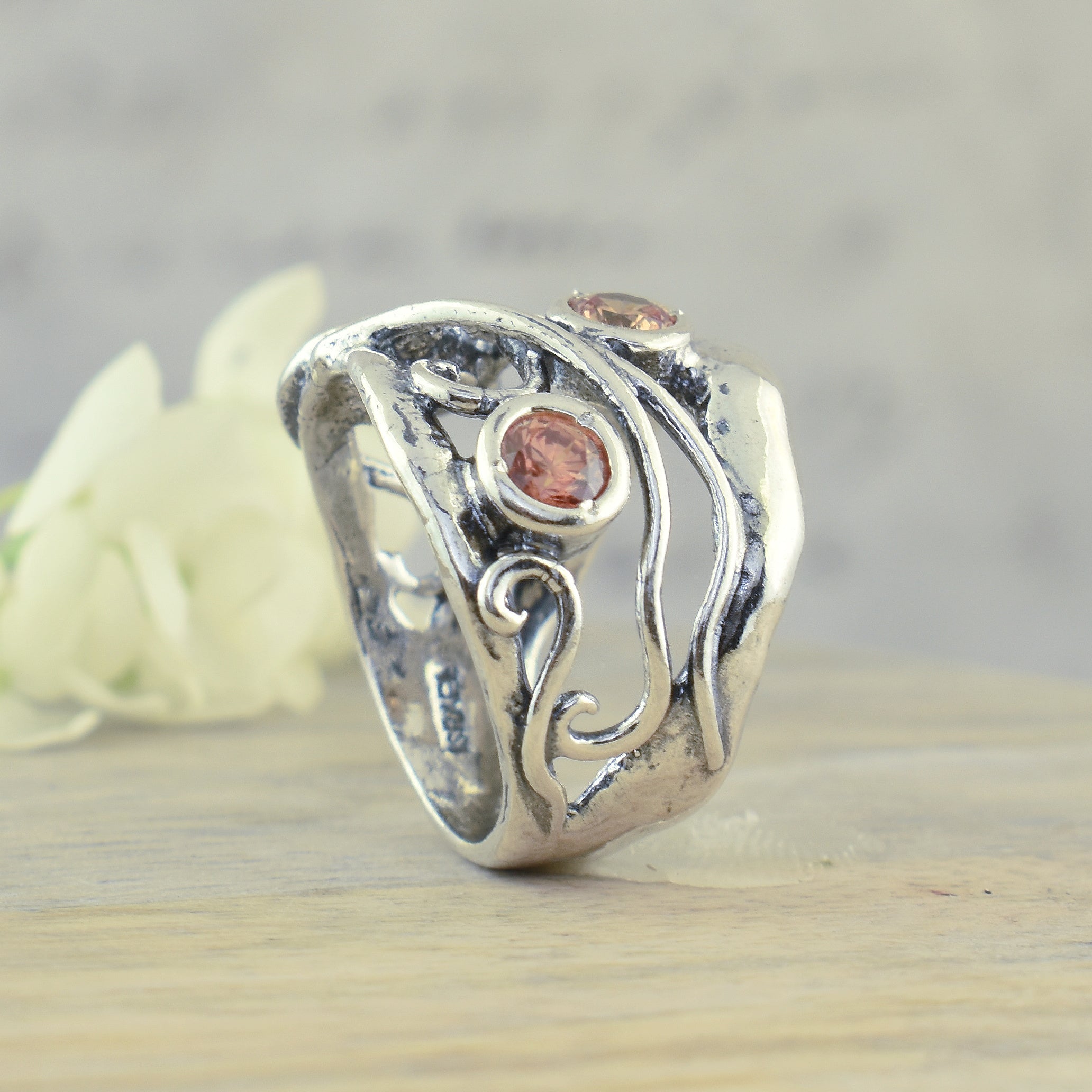 Oxidized sterling silver swirl ring with cz