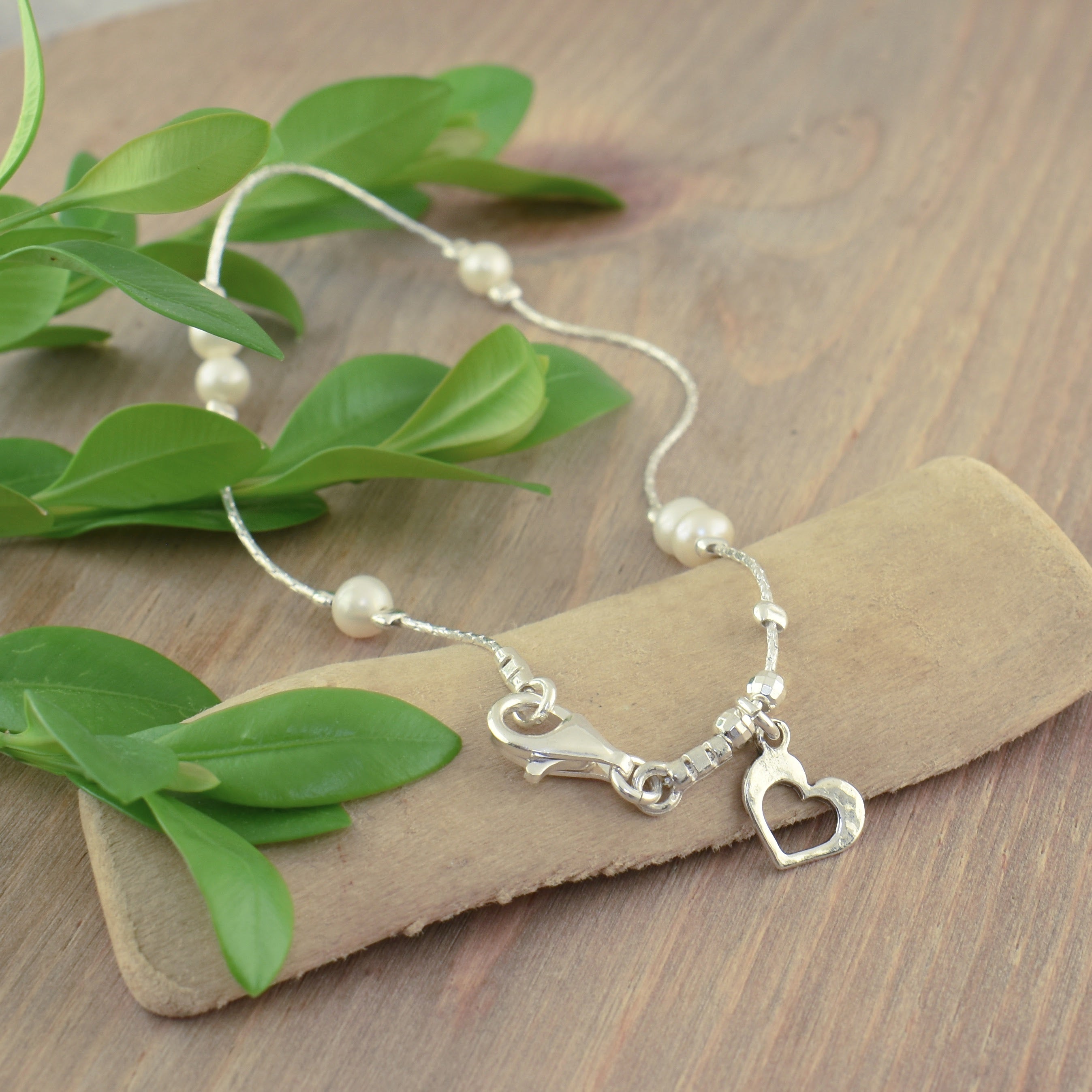 .925 sterling silver anklet featuring freshwater pearls and a dainty hammered heart