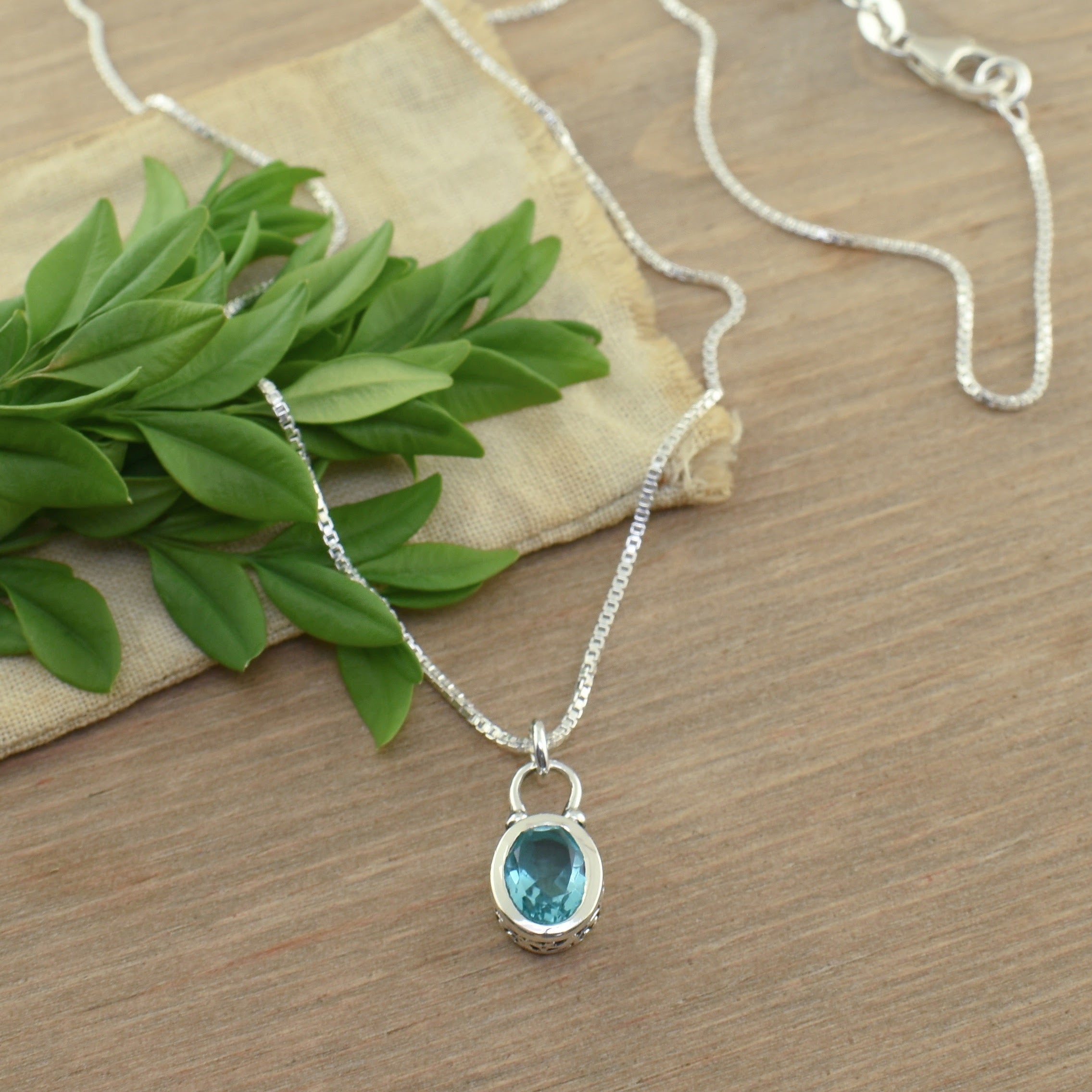 .925 sterling silver necklace with teal oval stone
