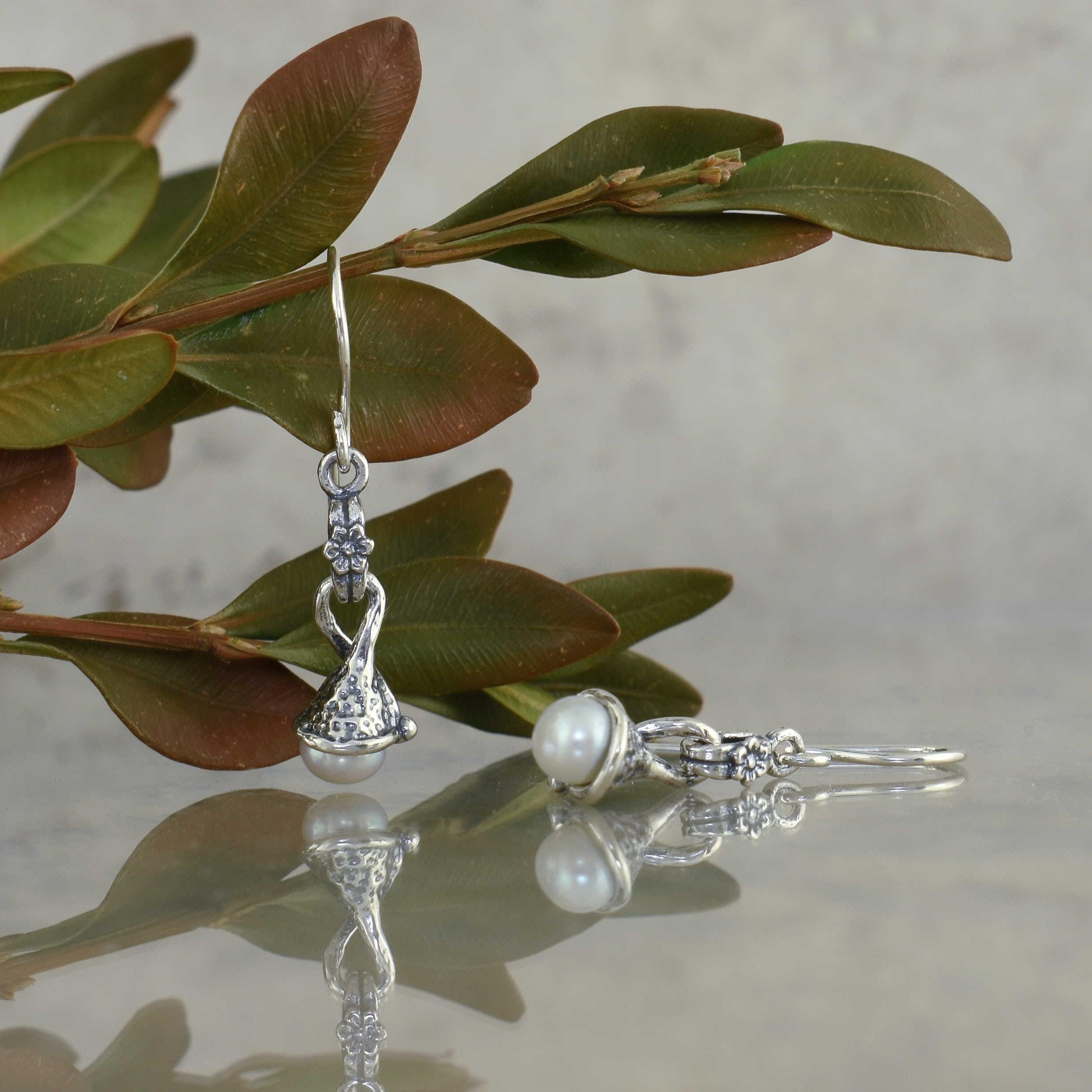 Handcrafted .925 sterling silver earrings with freshwater pearl