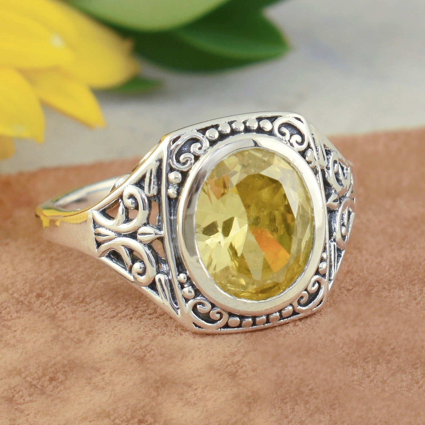 chunky sterling silver ring with filigree detail and yellow cz stone